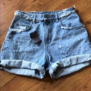 Size 27 Carmar distressed shorts